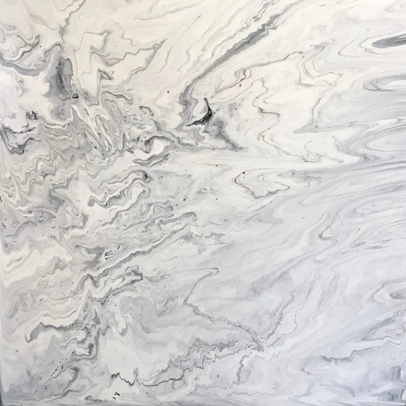 Acrylic pour painting on wood panel.  24 x 24 black & white.